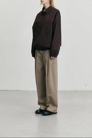 Détail devant pantalon chino large beige Dunst