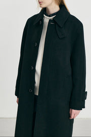 Dunst manteau mac noir femme porté en angle
